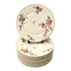 Set of 11 flat plates flowered porcelain