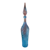 Large turquoise bottle