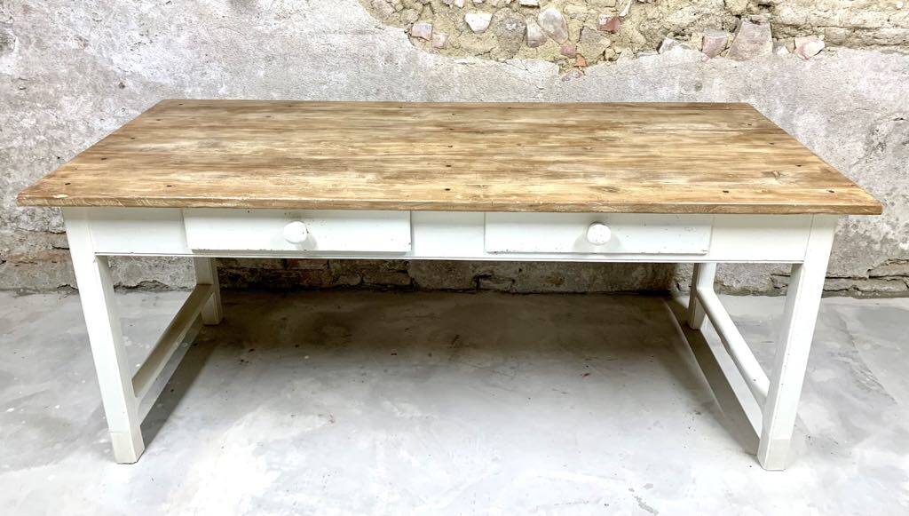 Farm table with off-white legs.