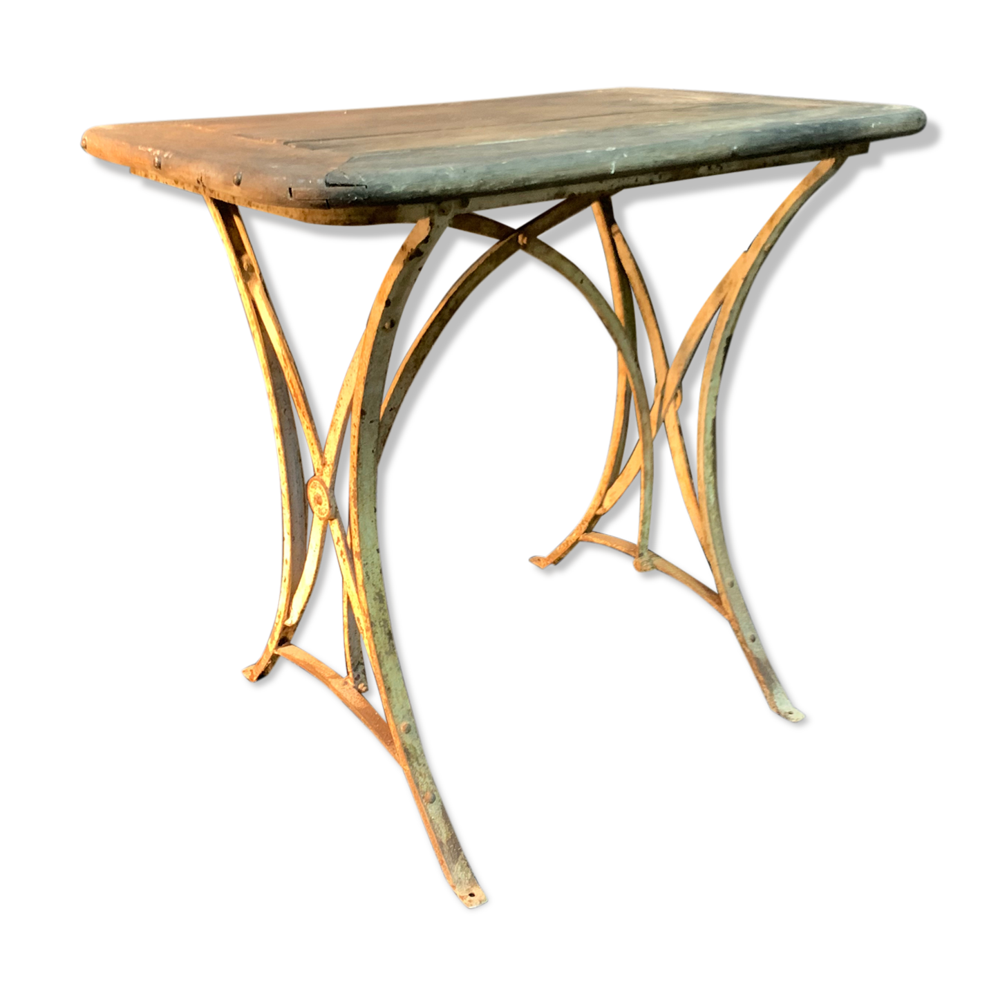 Ancient wrought iron and wood garden table