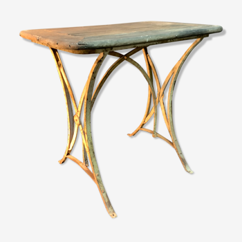 Ancienne table de jardin en fer forgé et bois
