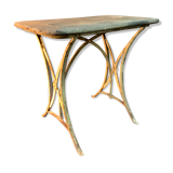 Ancient wrought iron and wood garden table
