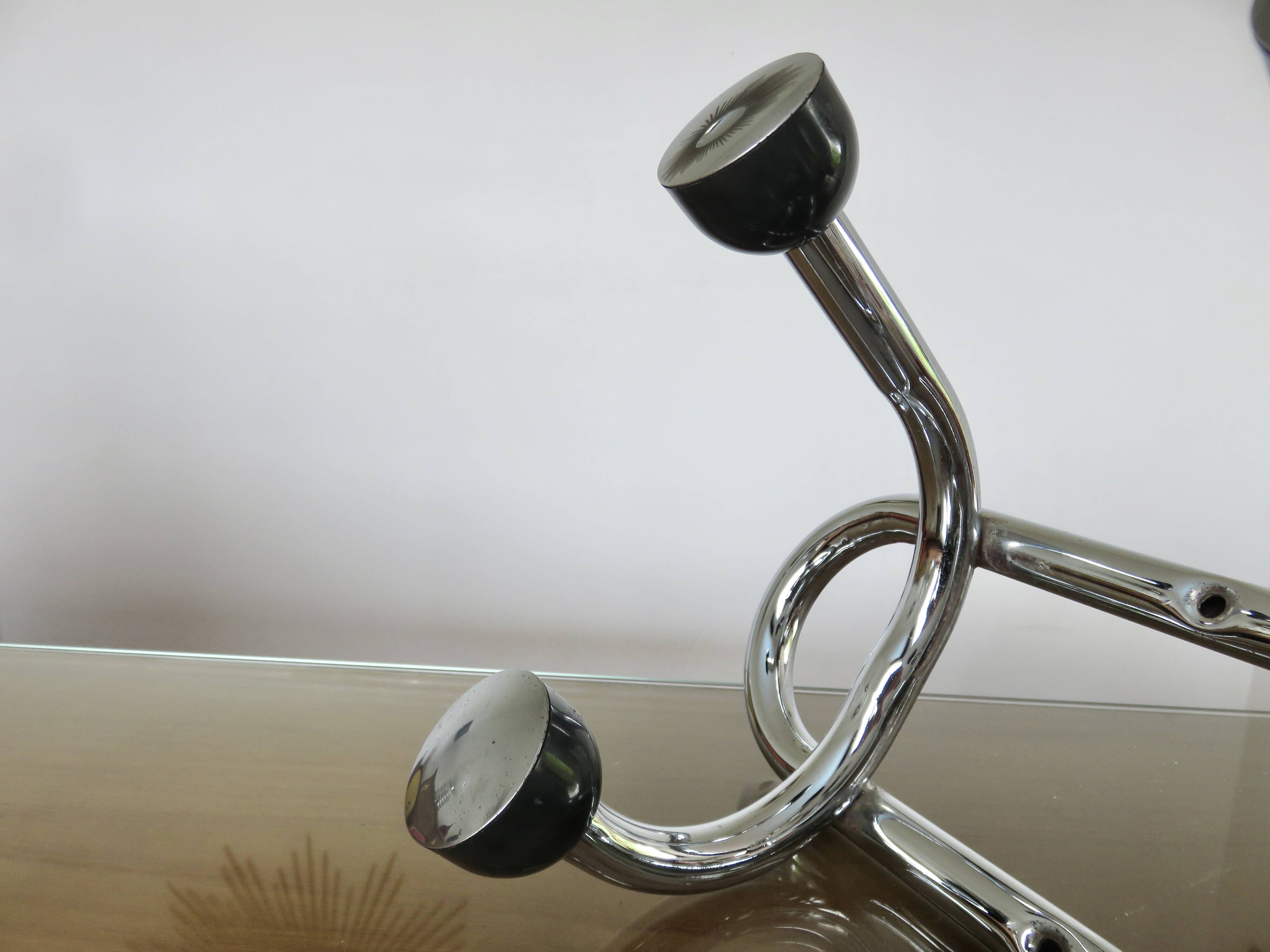 Streamlined coat rack, rockabilly, in chrome metal and bakelite 1970
