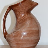 Brown painted earthenware pitcher