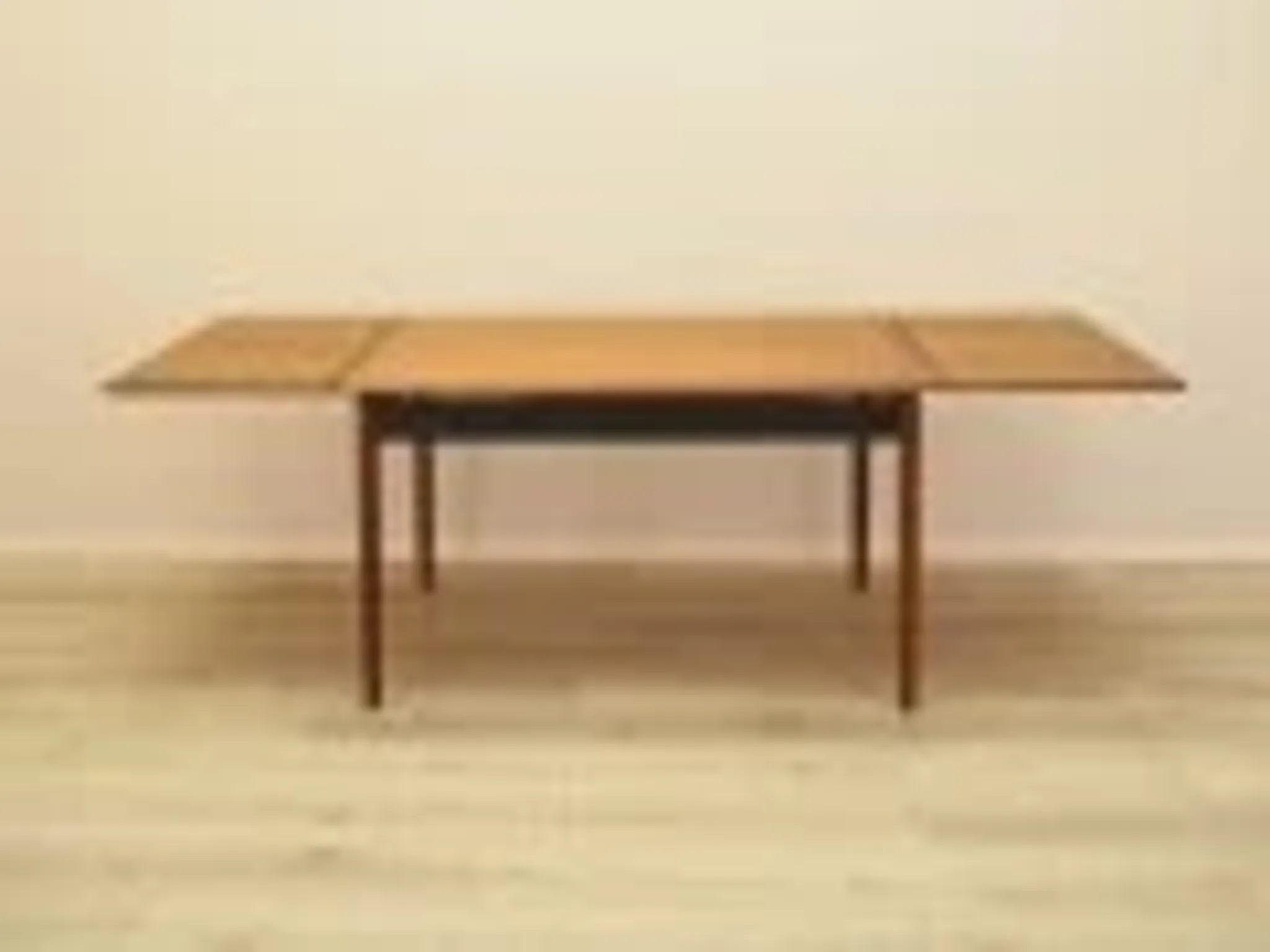 Danish extendable dining table, teak veneer, solid wood legs, leaf storage, 1970s