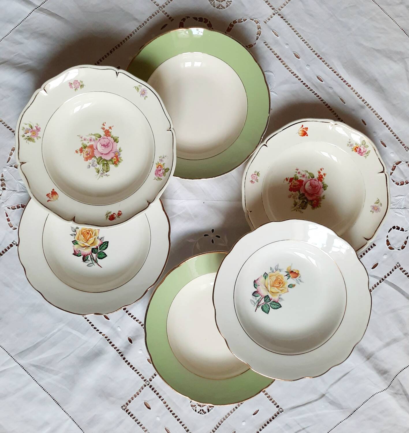 Old mismatched earthenware soup plates