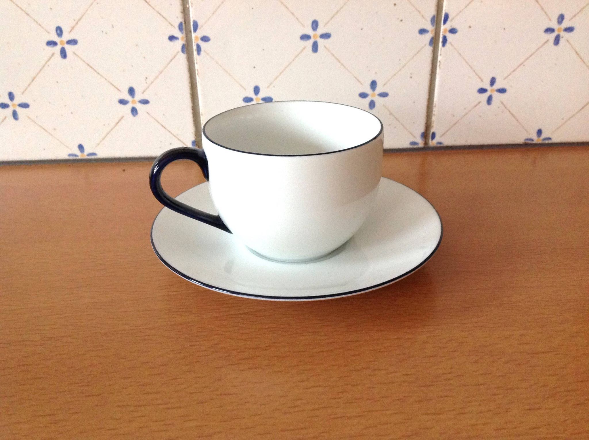 Set of eight white porcelain cups with blue edging / vintage 70s-80s