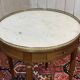 Louis XVI style bouillotte table from the 1960s in mahogany with a marble top.