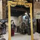 Monumental mirror Napoleon III in gilded wood with the profile of Apollo