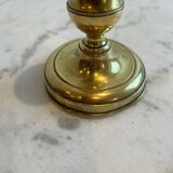 Bougeoir ancien en cuivre à bouton pressoir