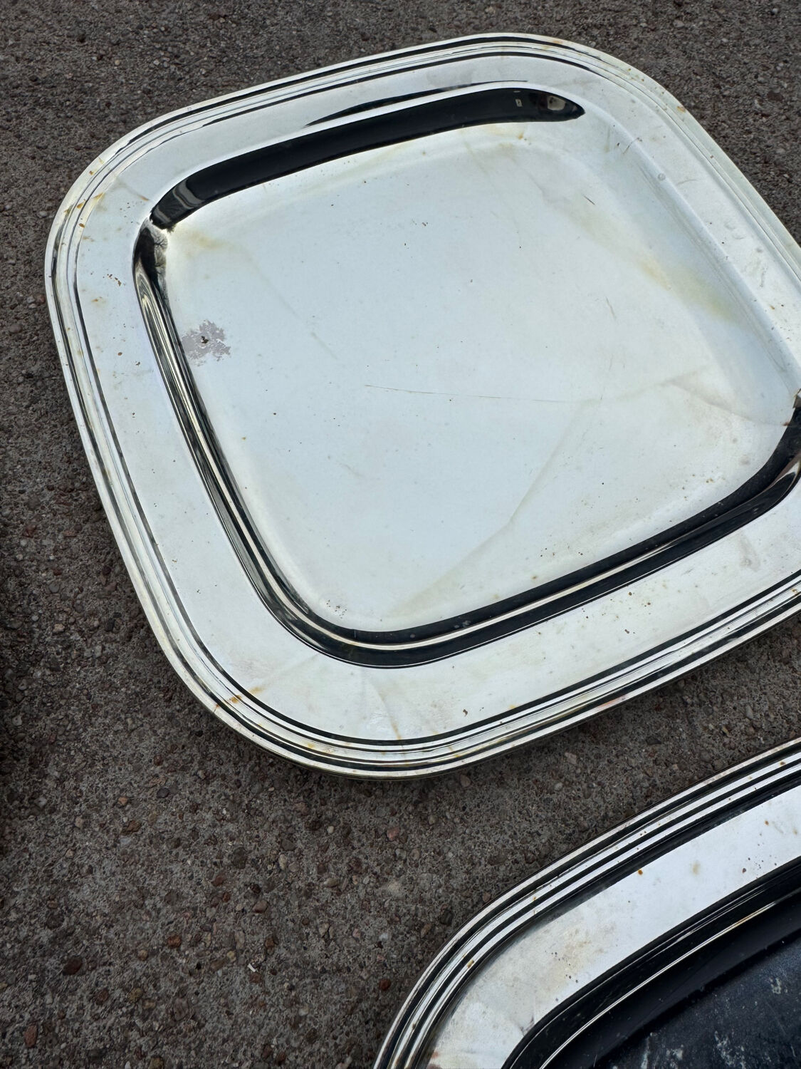 Silver-plated metal underplates from the 1980s.