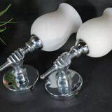 Pair of chrome-plated metal wall lights, hand-shaped with lampshade