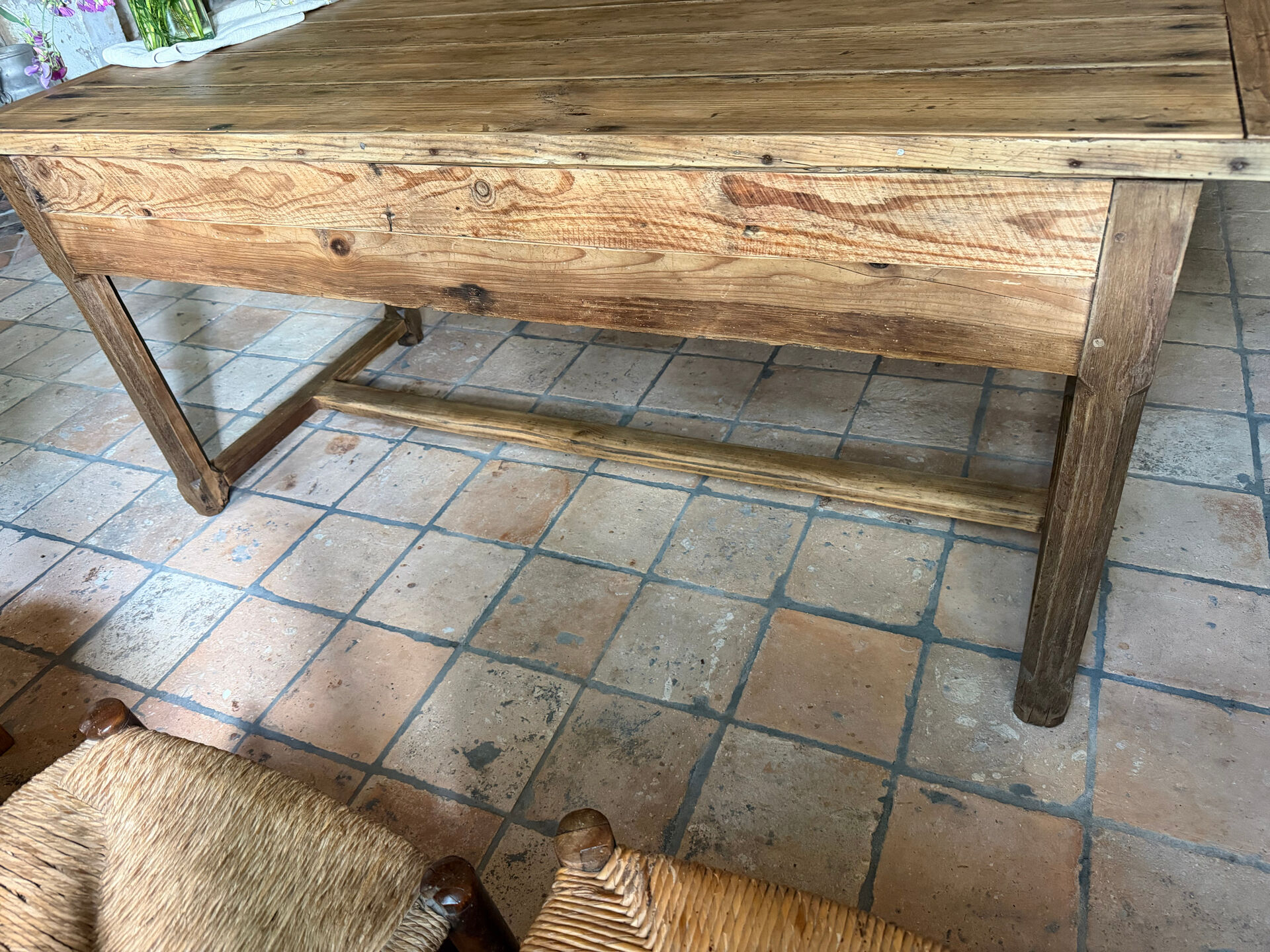 Renovated raw wood farmhouse table