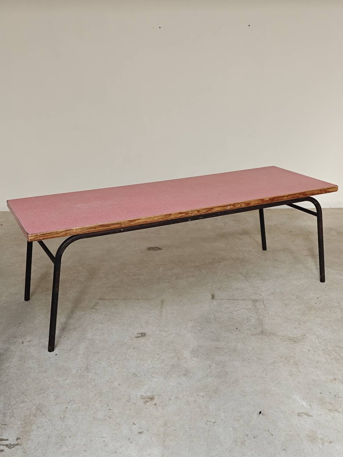 Large canteen table in pink formica and metal.