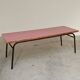Large canteen table in pink formica and metal.