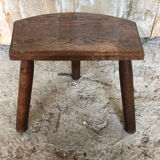 Old vintage wooden tripod milking stool