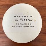 Set of 13 vintage ceramic coasters handmade by Lito Niarchos.