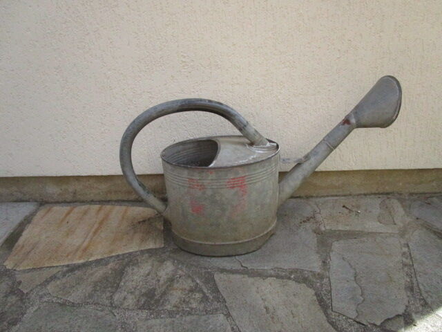Old zinc watering can