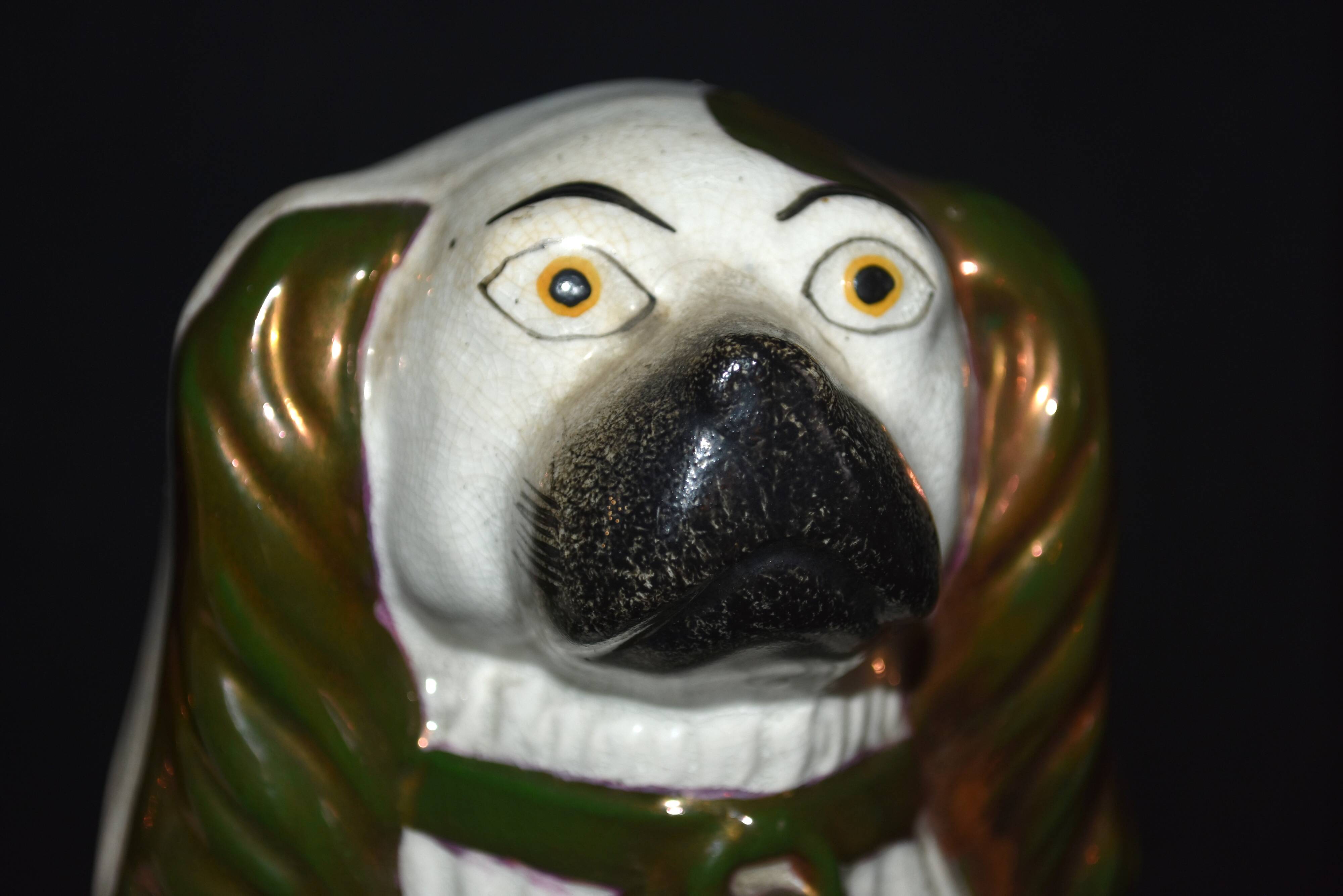 Pair of earthenware dogs (cavalier king charles)