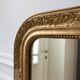 Wooden mirror and gilded stucco early twentieth century