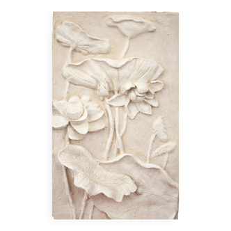 Bas-relief with flowers. Relief with flowers. Flowers in relief.