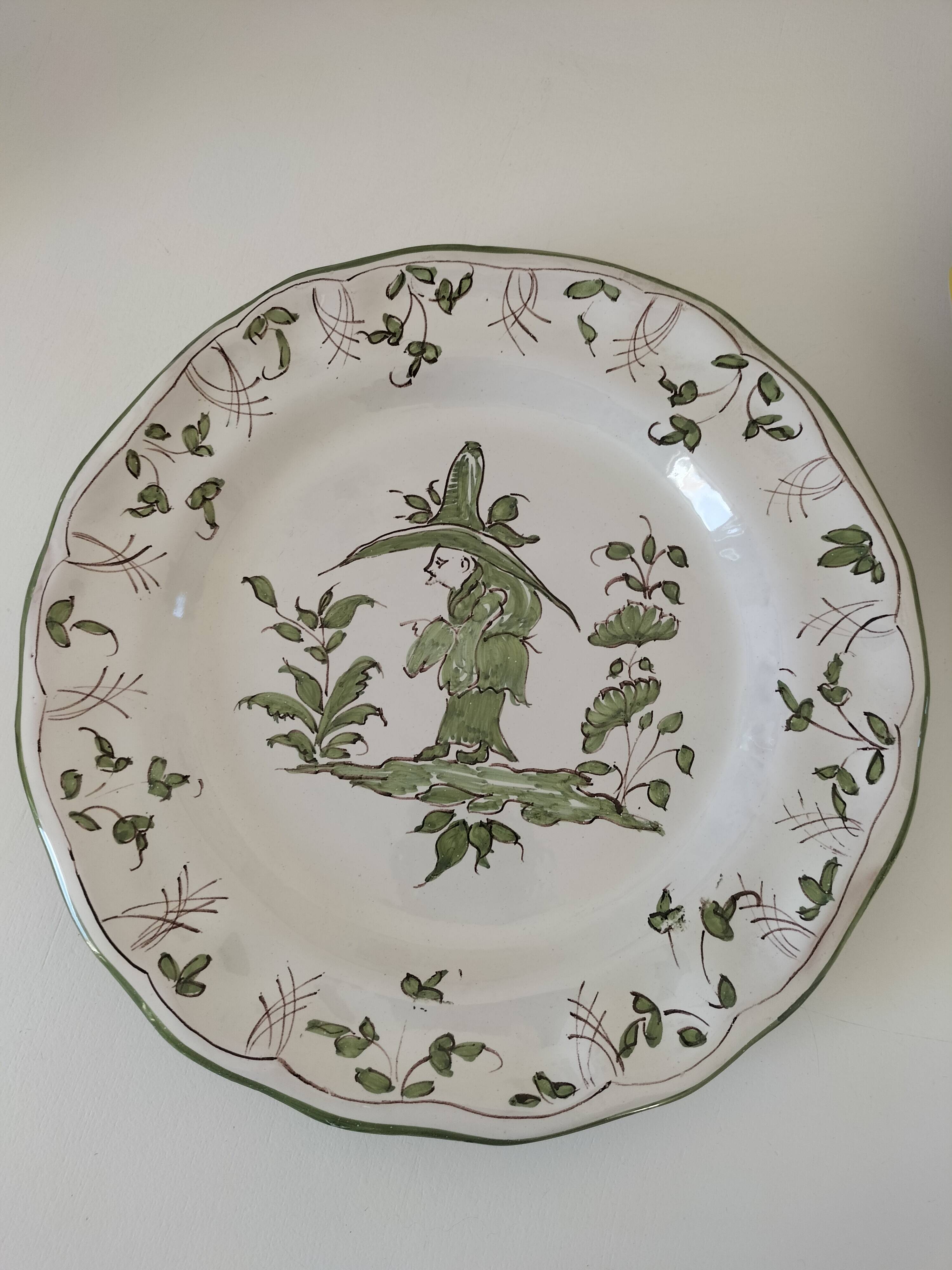 4 hand-painted earthenware plates in a holiday home style