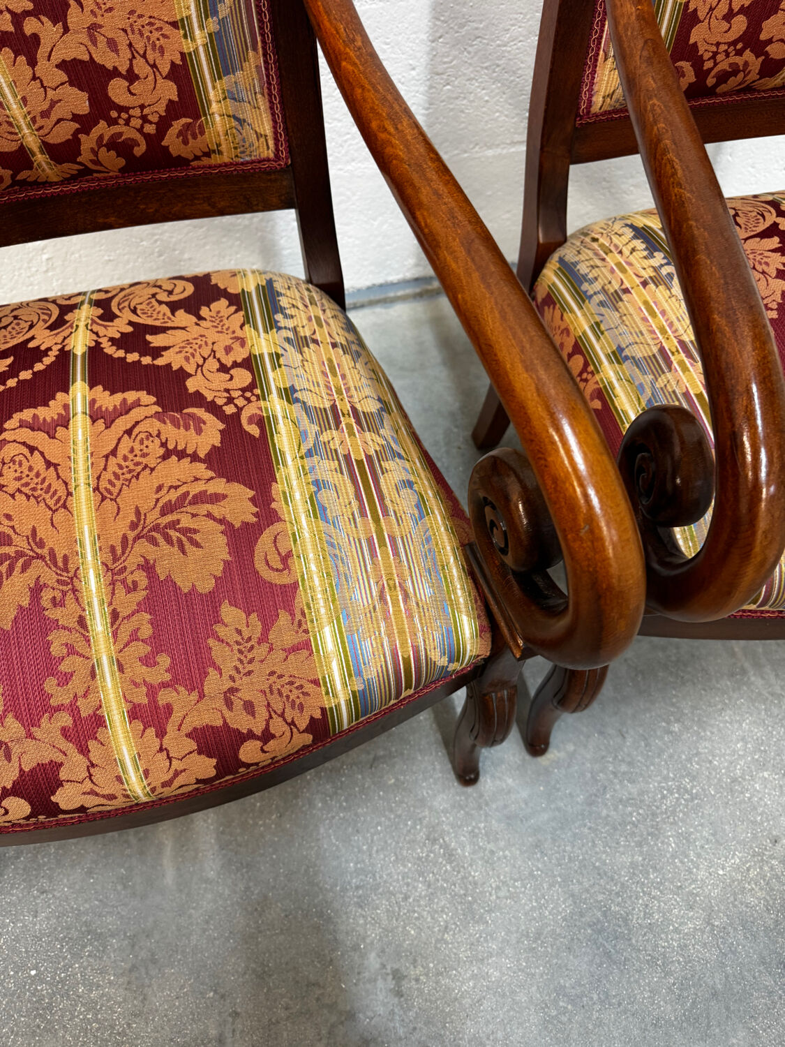 Pair of cross-back armchairs, Empire style, 19th century.
