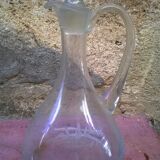 Carafe has décor engraved with foliage