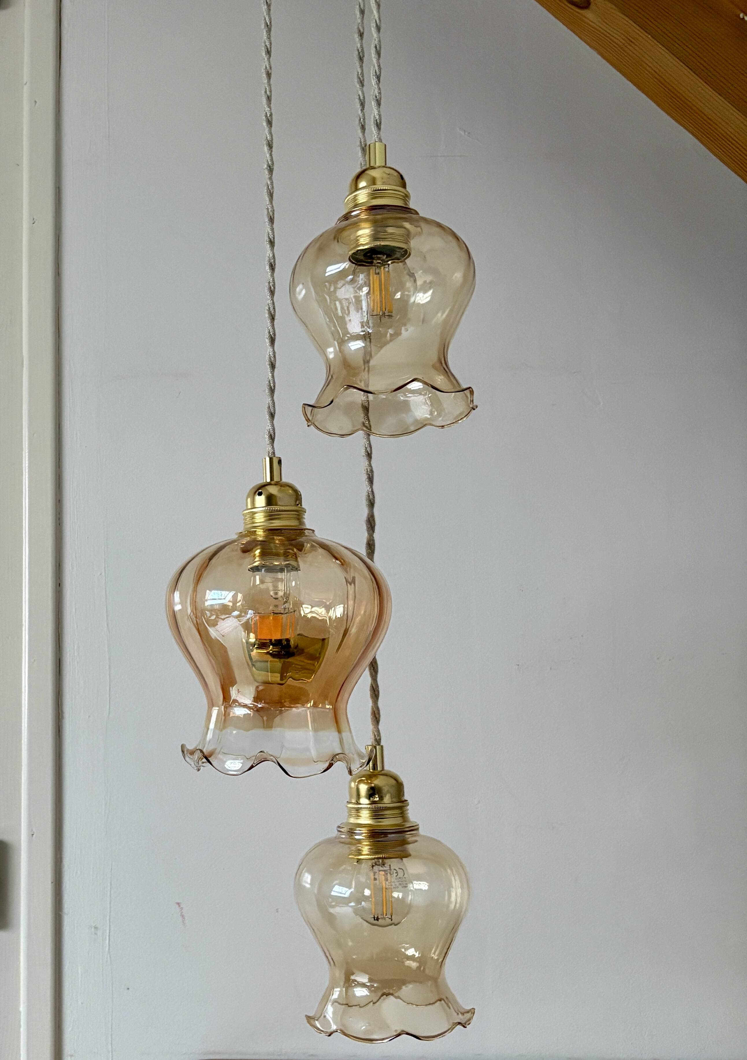 Triple vintage tulip pendant light in amber glass