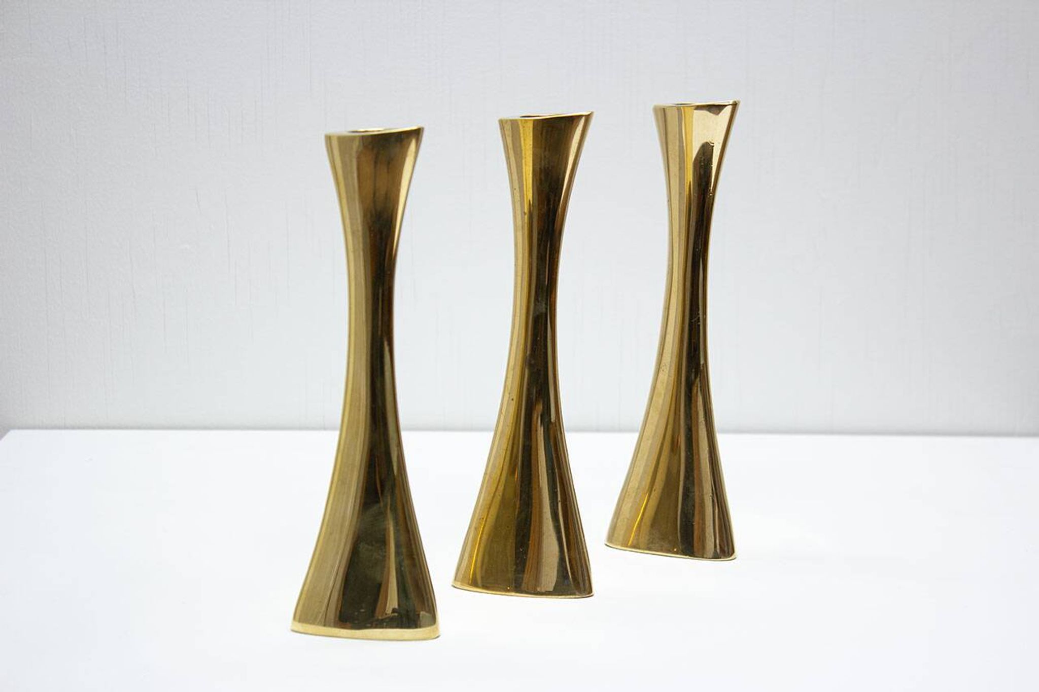 Set of 3 organic shaped brass candlesticks by K.E. Ytterberg, Sweden