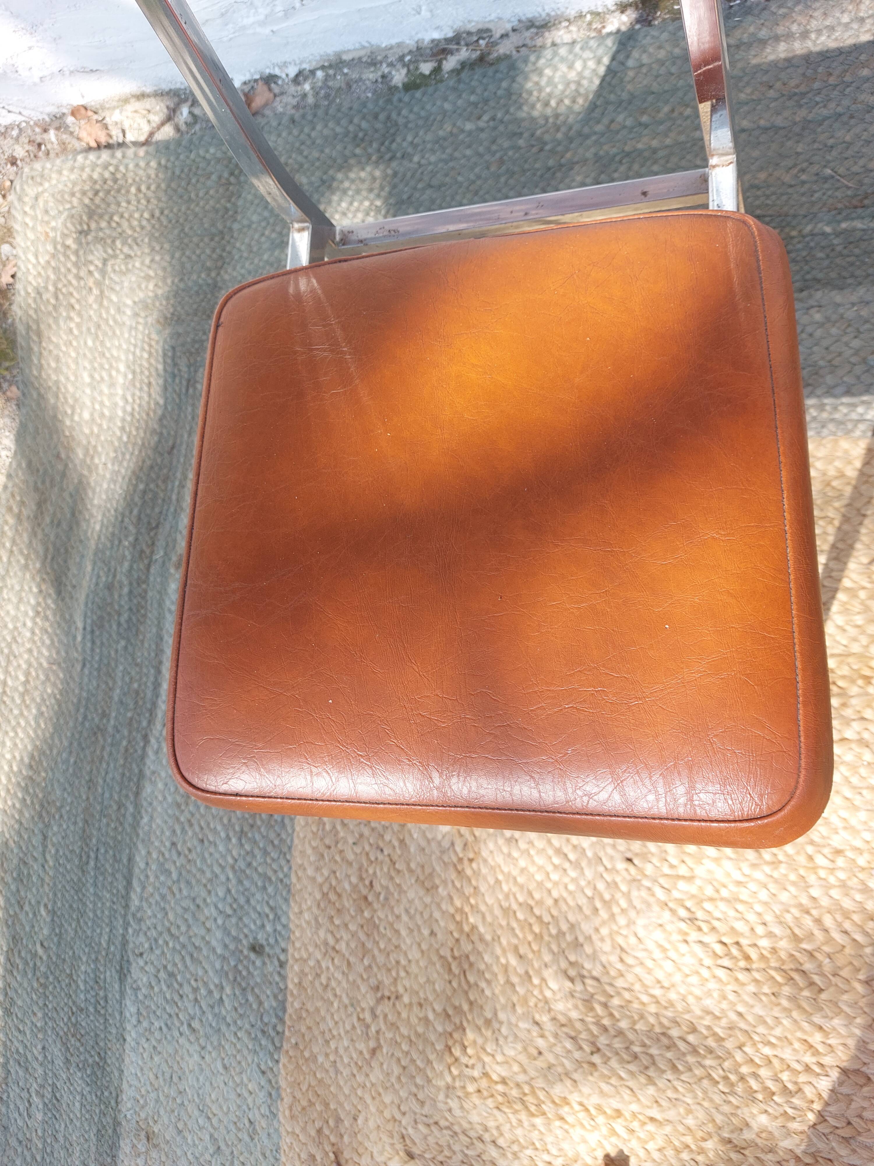 3 stainless steel tube chairs and faux leather, vintage