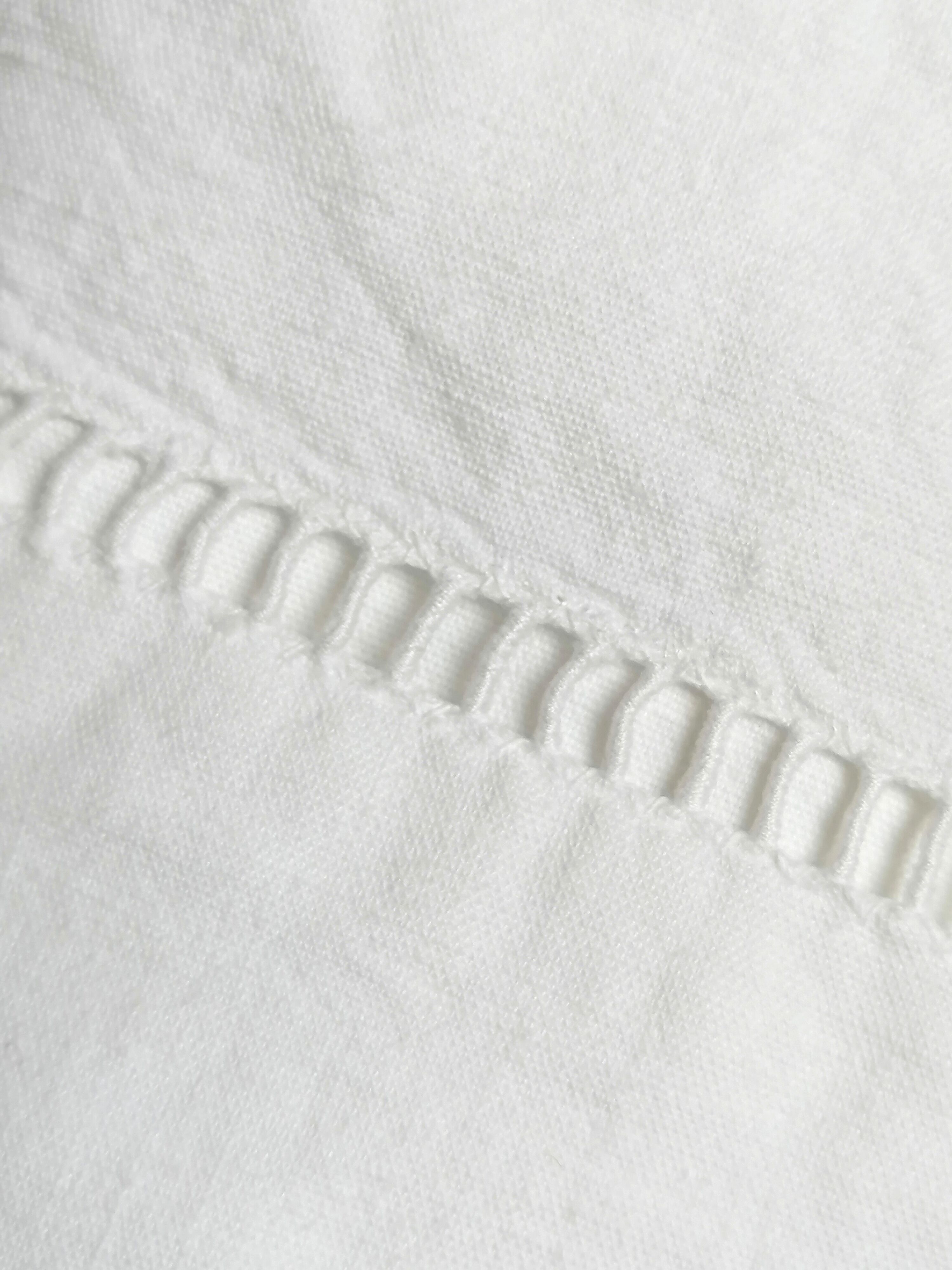 M and D monogram embroidered sheet