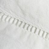 M and D monogram embroidered sheet