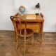Modernist vintage chest of drawers in light chene has 3 drawers rattan top changing table