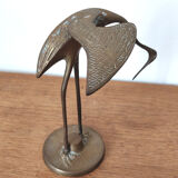 Couple herons in vintage brass
