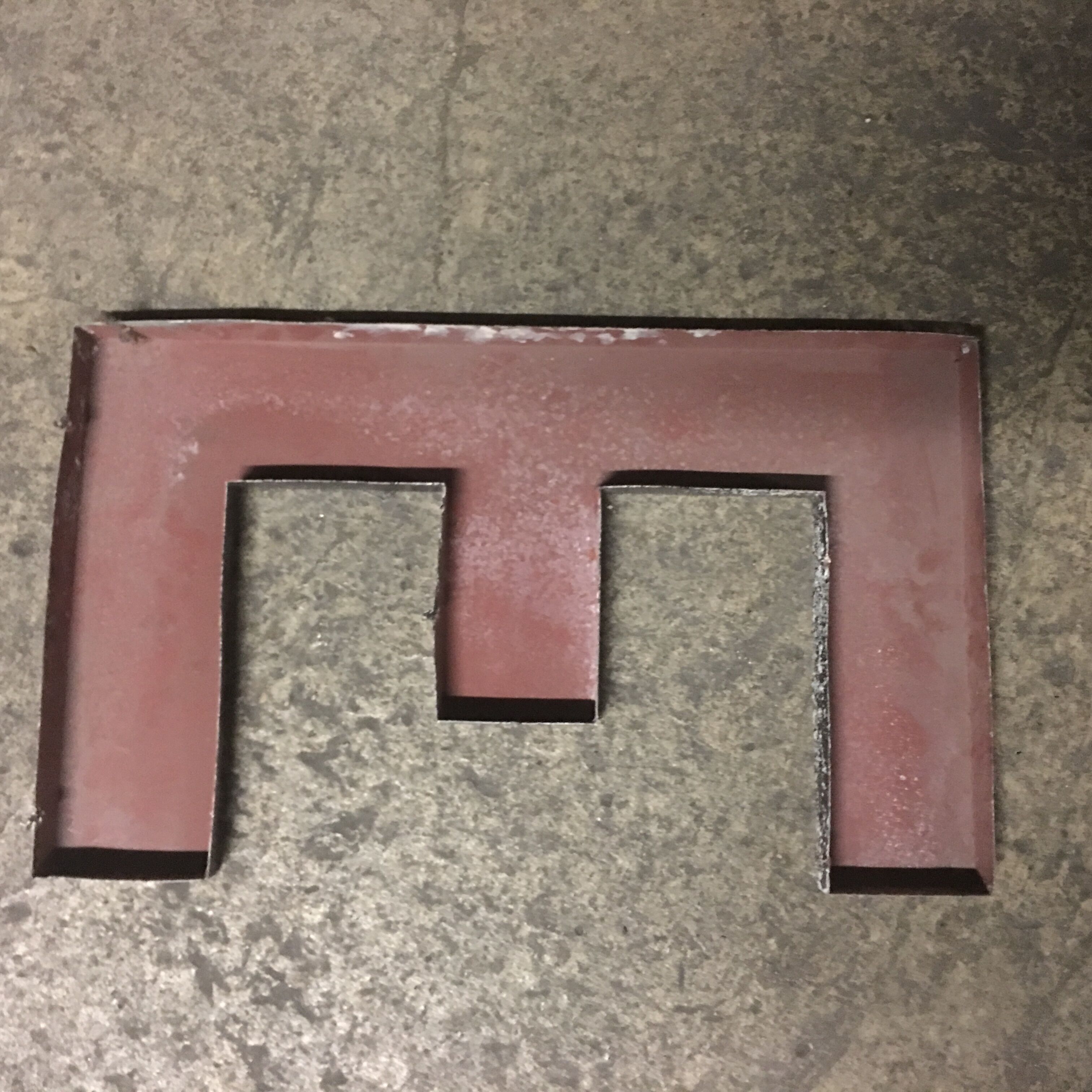 Letter e in old zinc