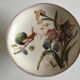 Assiette montée à gateaux en terre de fer 19e fleurs et oiseaux