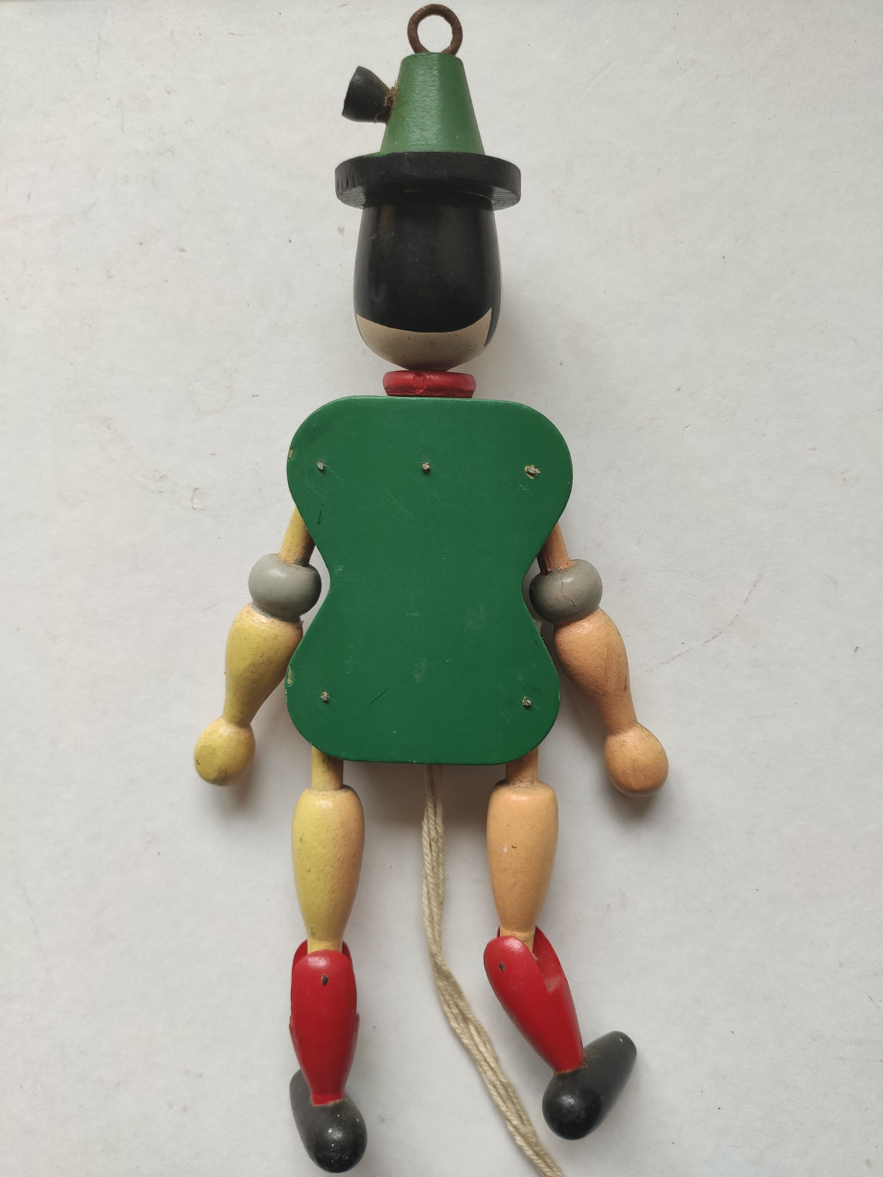 Articulated wooden puppet