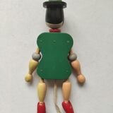Articulated wooden puppet