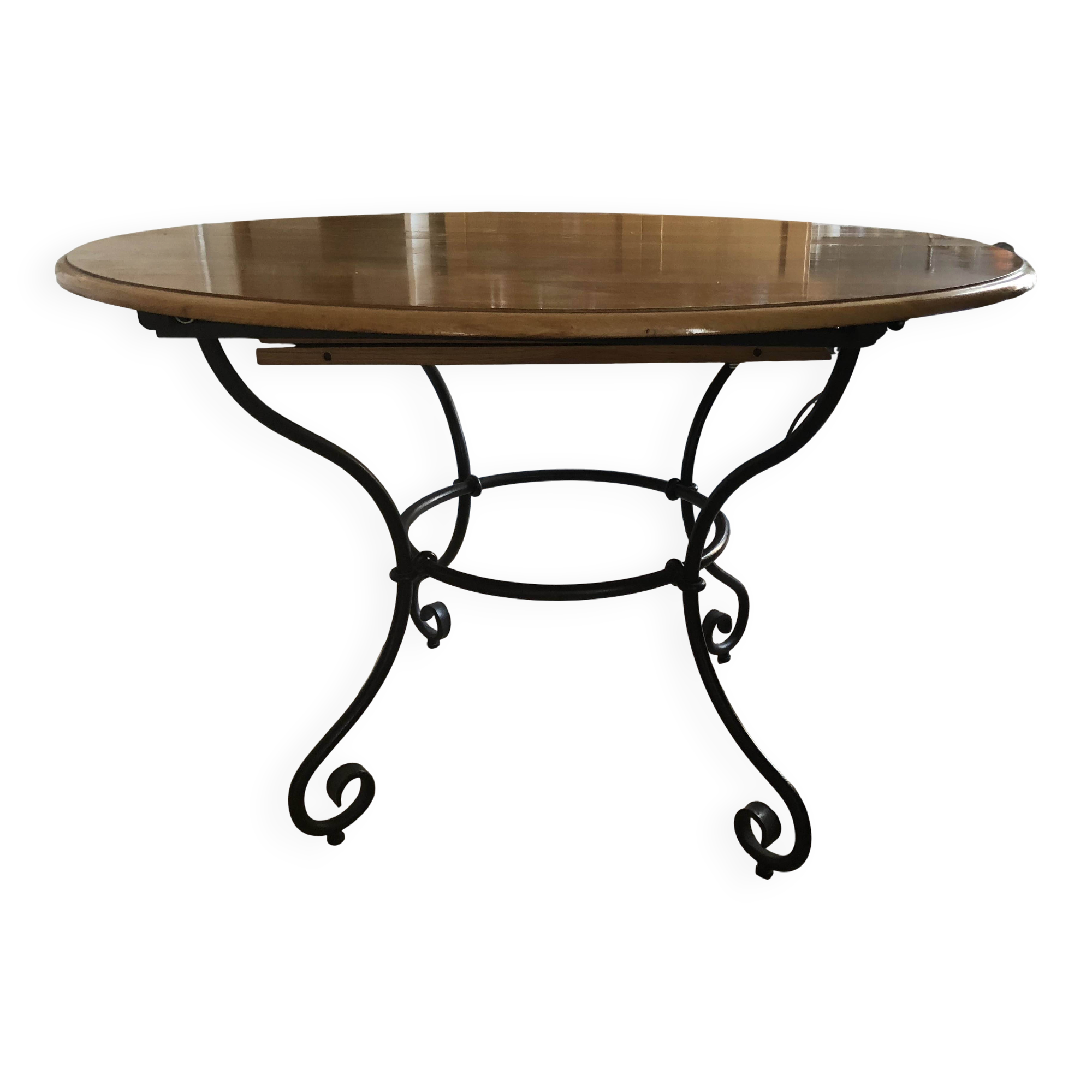 Extendable table in solid oak with wrought iron legs.