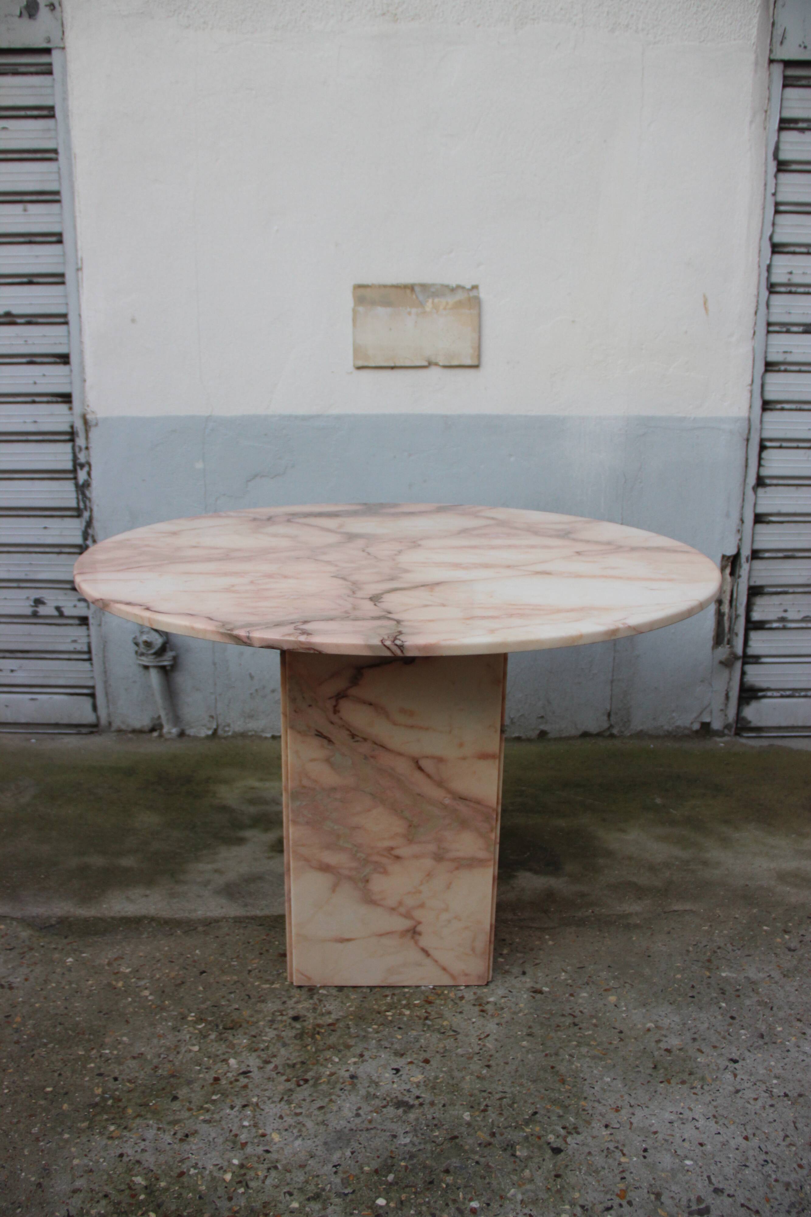 Pink marble dining table