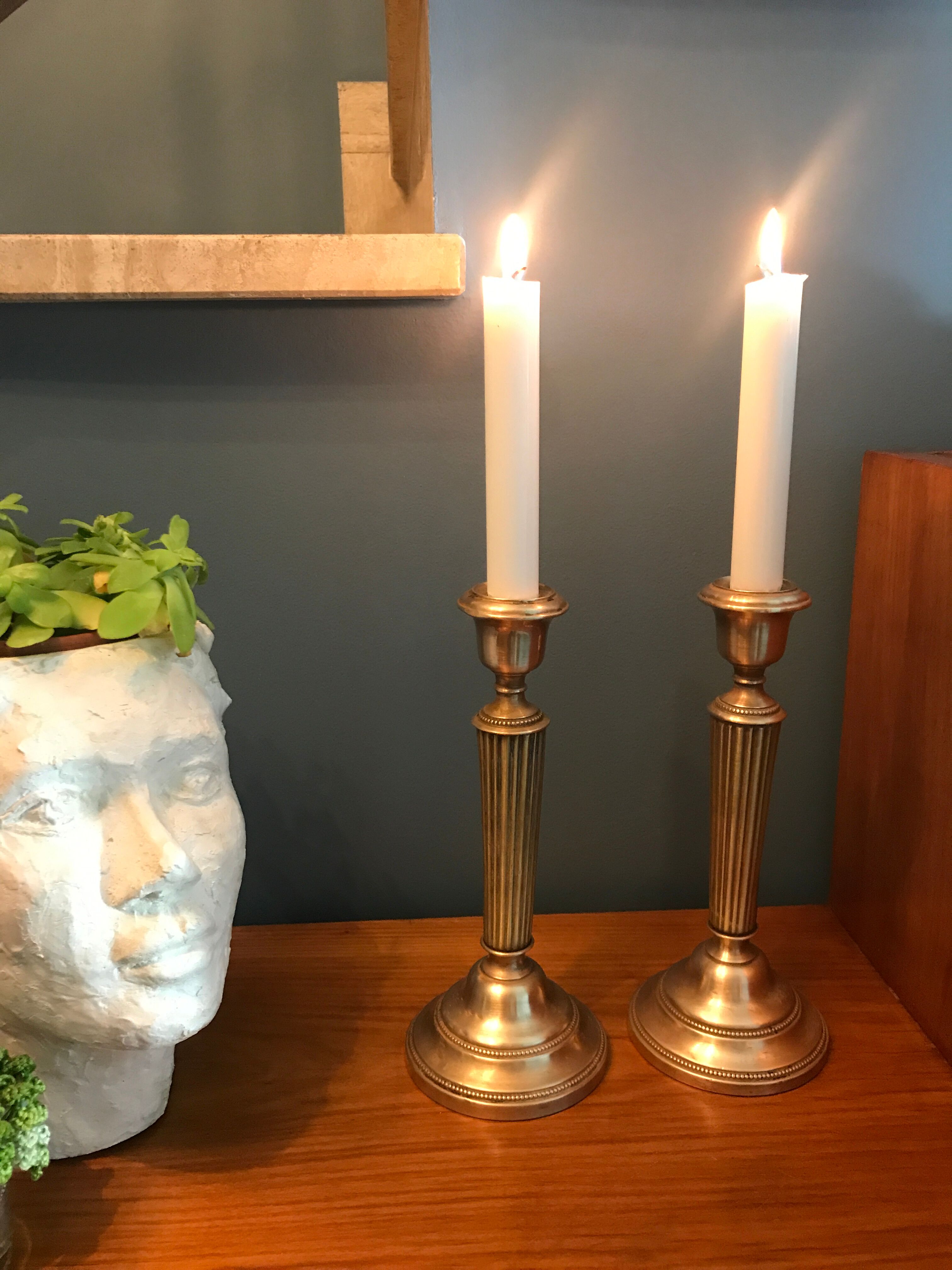 Pair of old brass candlesticks