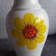 Vintage vase with floral decoration