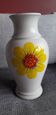 Vintage vase with floral decoration