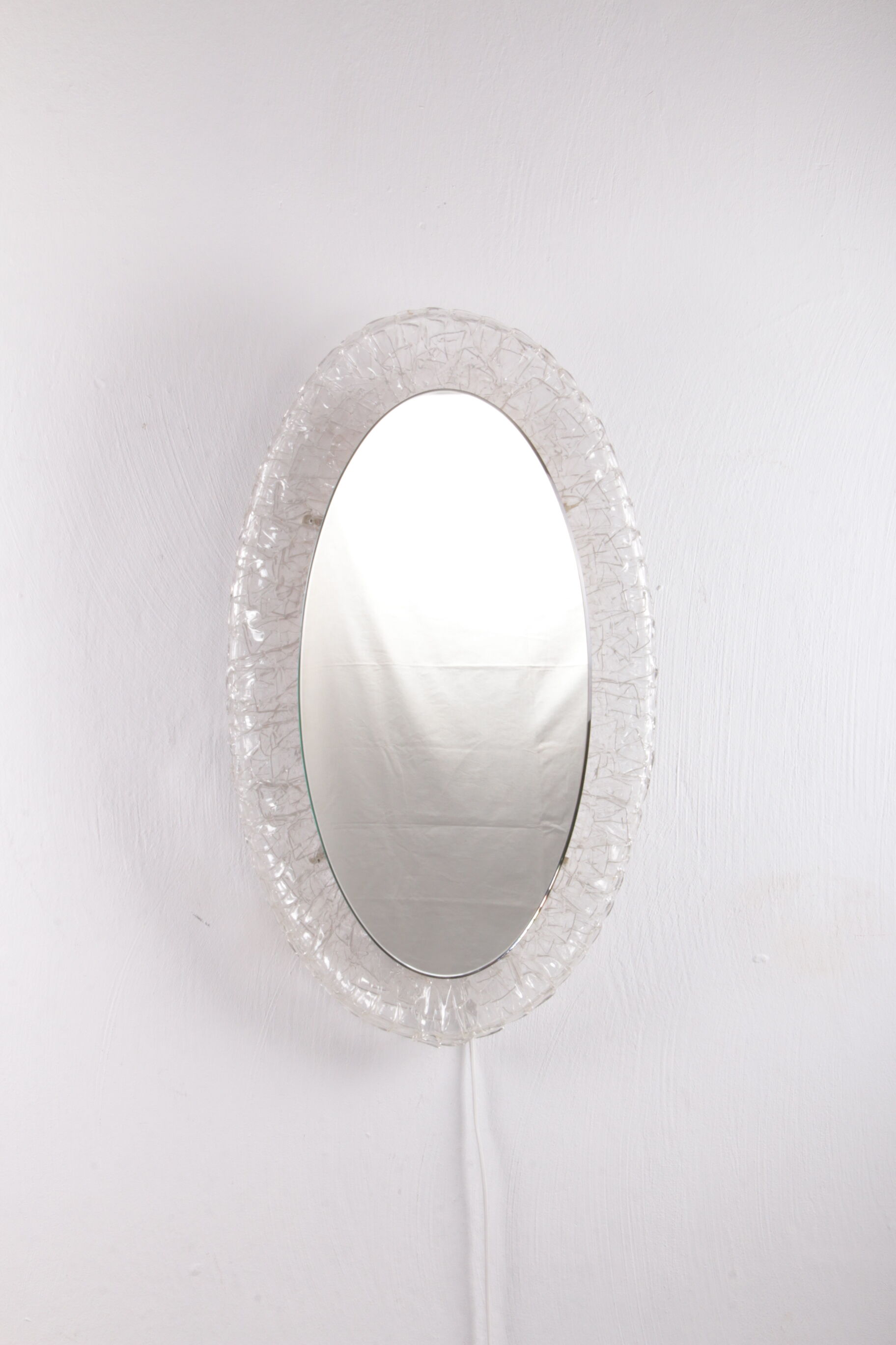 Large Oval Plexiglas mirror with lighting, 1960 Germany.