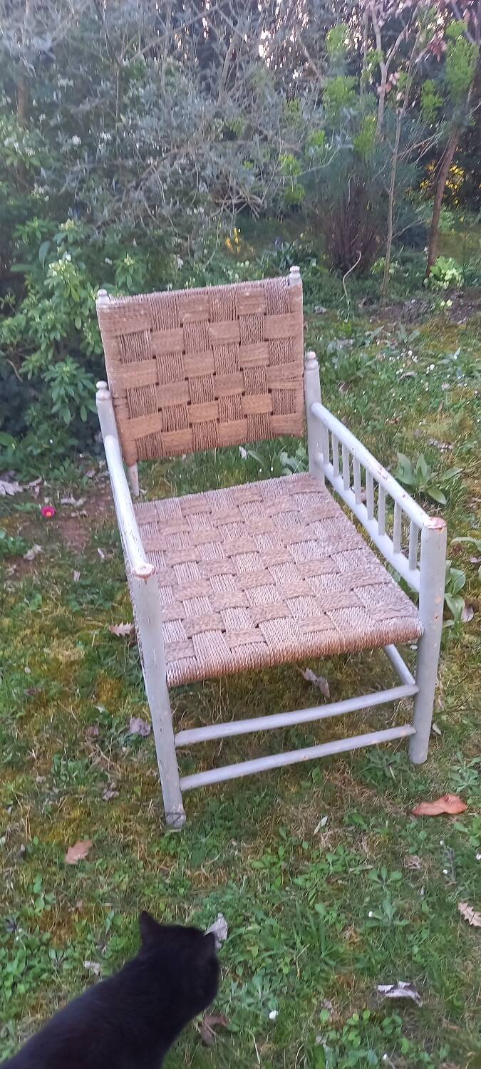Rope-woven wooden armchair
