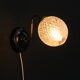 Globe wall applies in molded glass, brass swan collar