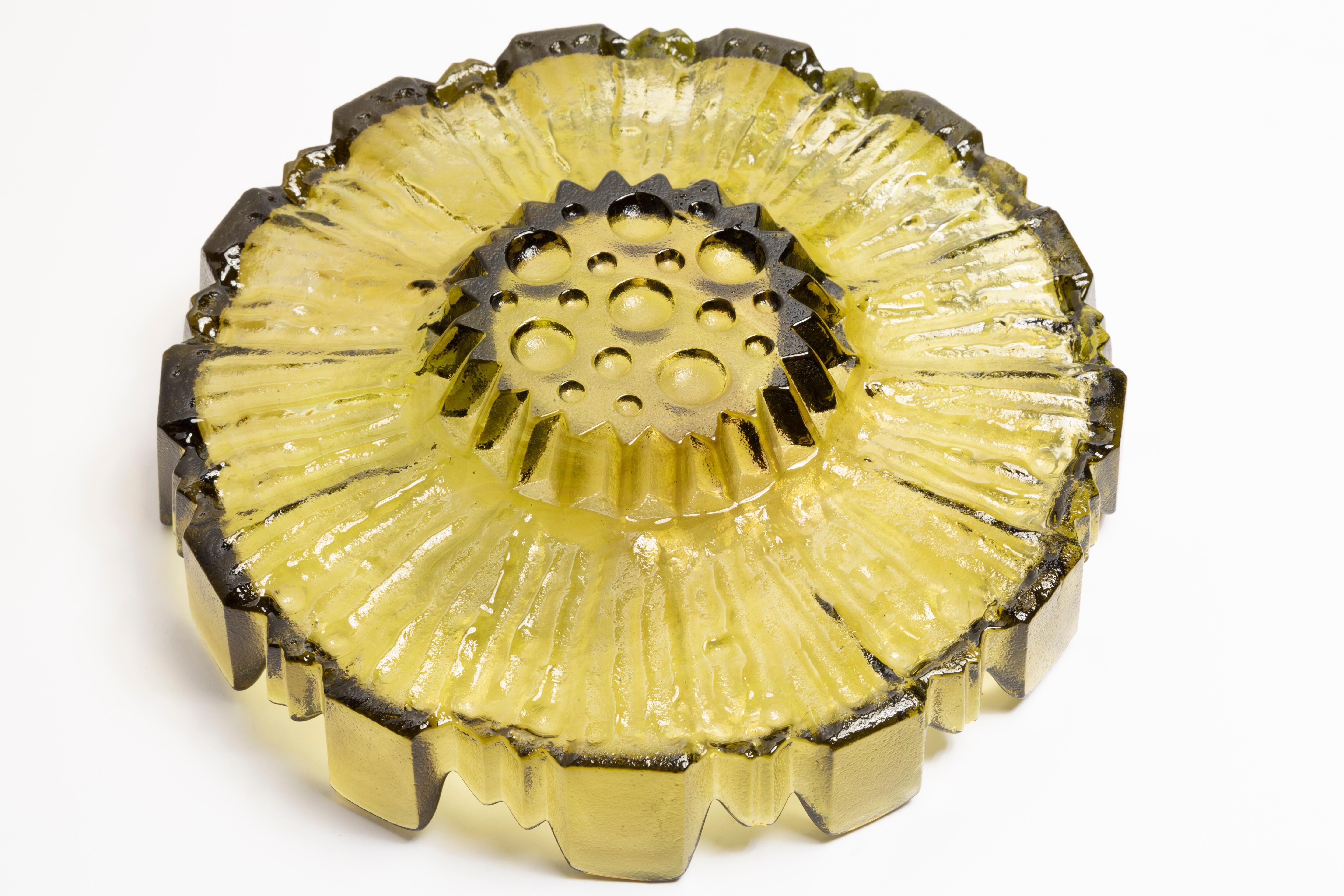 Decorative green glass flower-shaped plate, Italy, 1960s.