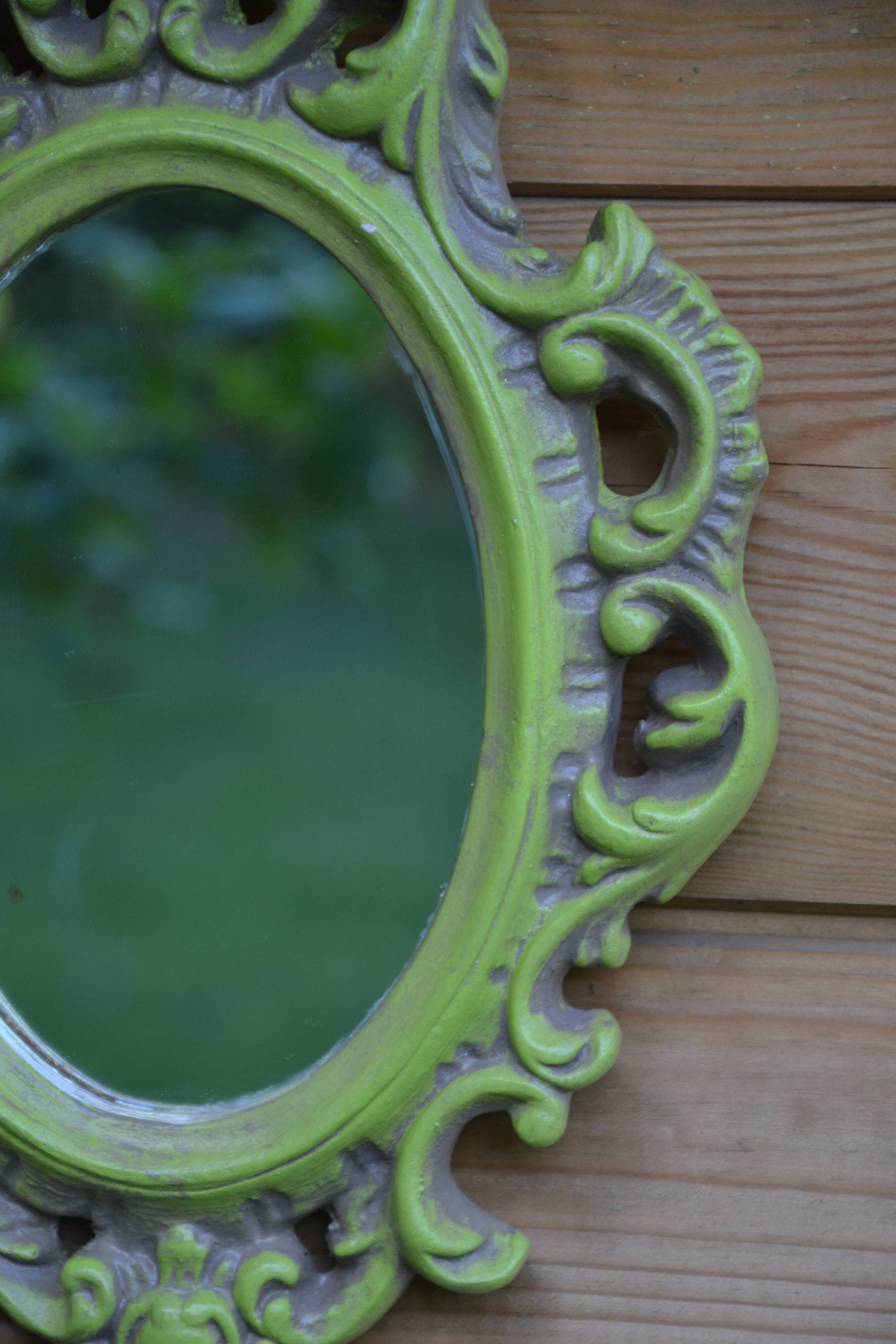 Small green wooden mirror