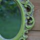 Small green wooden mirror